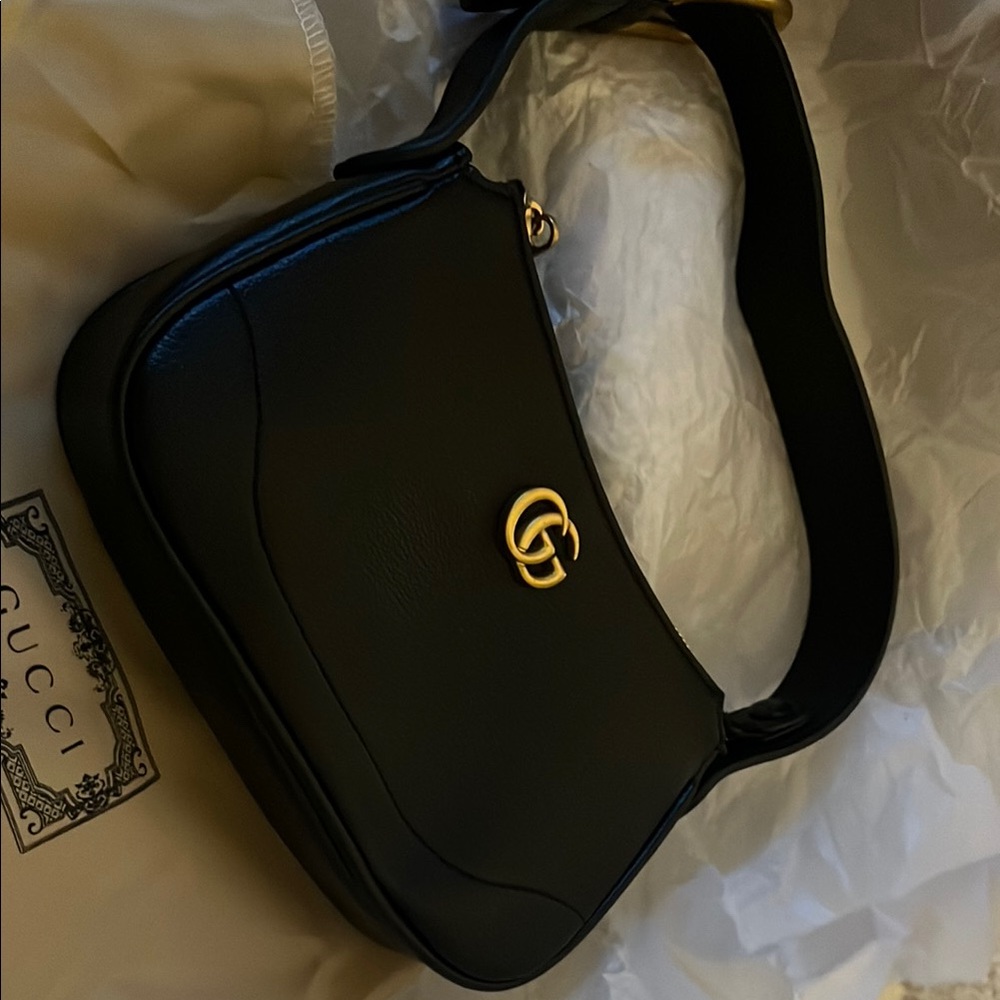 Gucci Black Leather Shoulder Bag with Gold Buckle